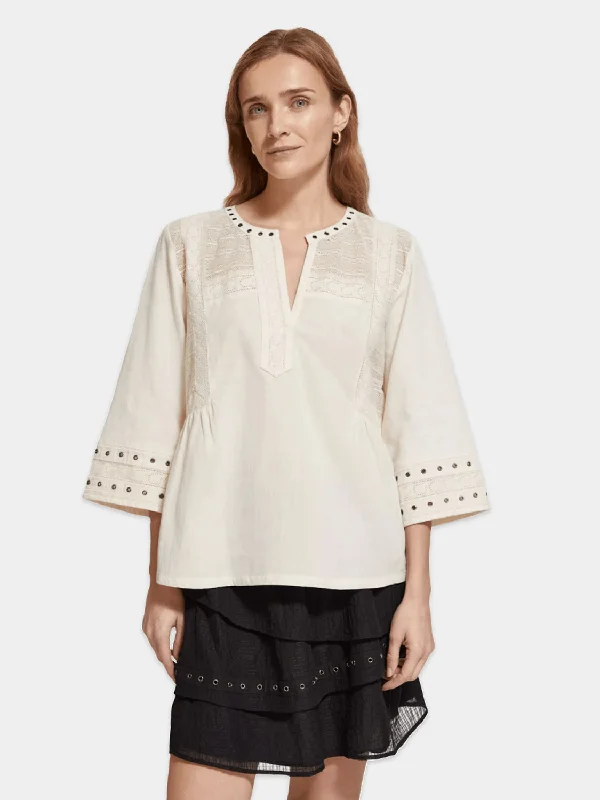 Top with eyelet details